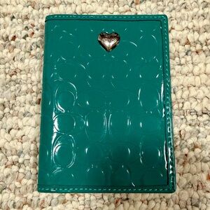 Coach Passport Holder. Teal patent leather. Very well loved